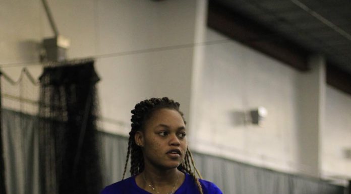 Tasha Dembo prepares to serve during a Marauders match in 2019