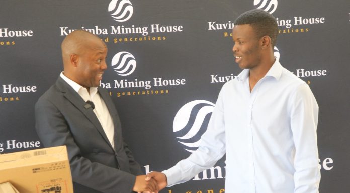 Kuvimba CEO Simba Chinyemba with one of the ED-UNZA beneficiaries